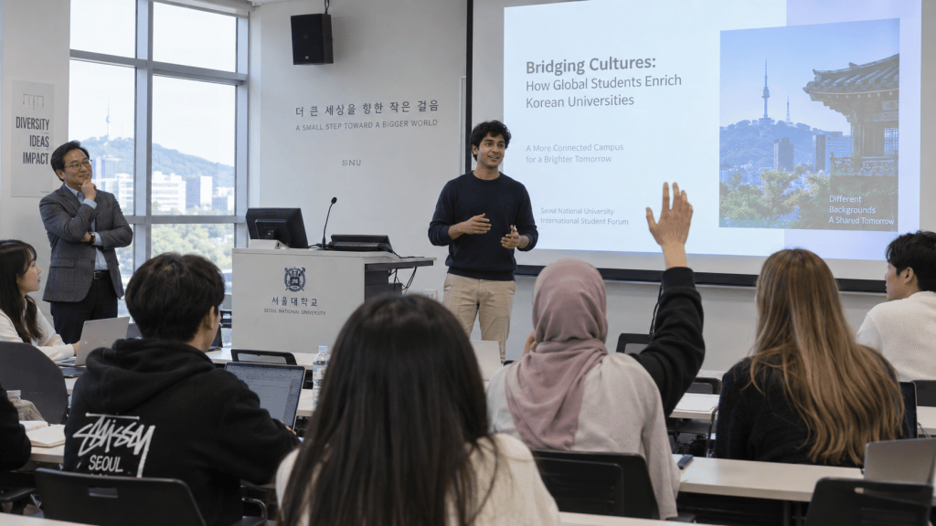A classroom session at Seoul National University featuring a speaker presenting on the topic 'Bridging Cultures: How Global Students Enrich Korean Universities.' Students are engaged and listening, with a presentation screen showing related visuals.