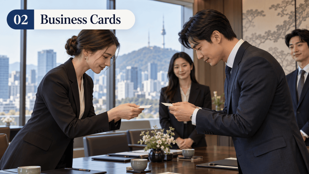 A business meeting scene with two professionals exchanging business cards, featuring a city skyline in the background. The male and female business people are dressed in formal attire, and there are two additional individuals observing in the background.